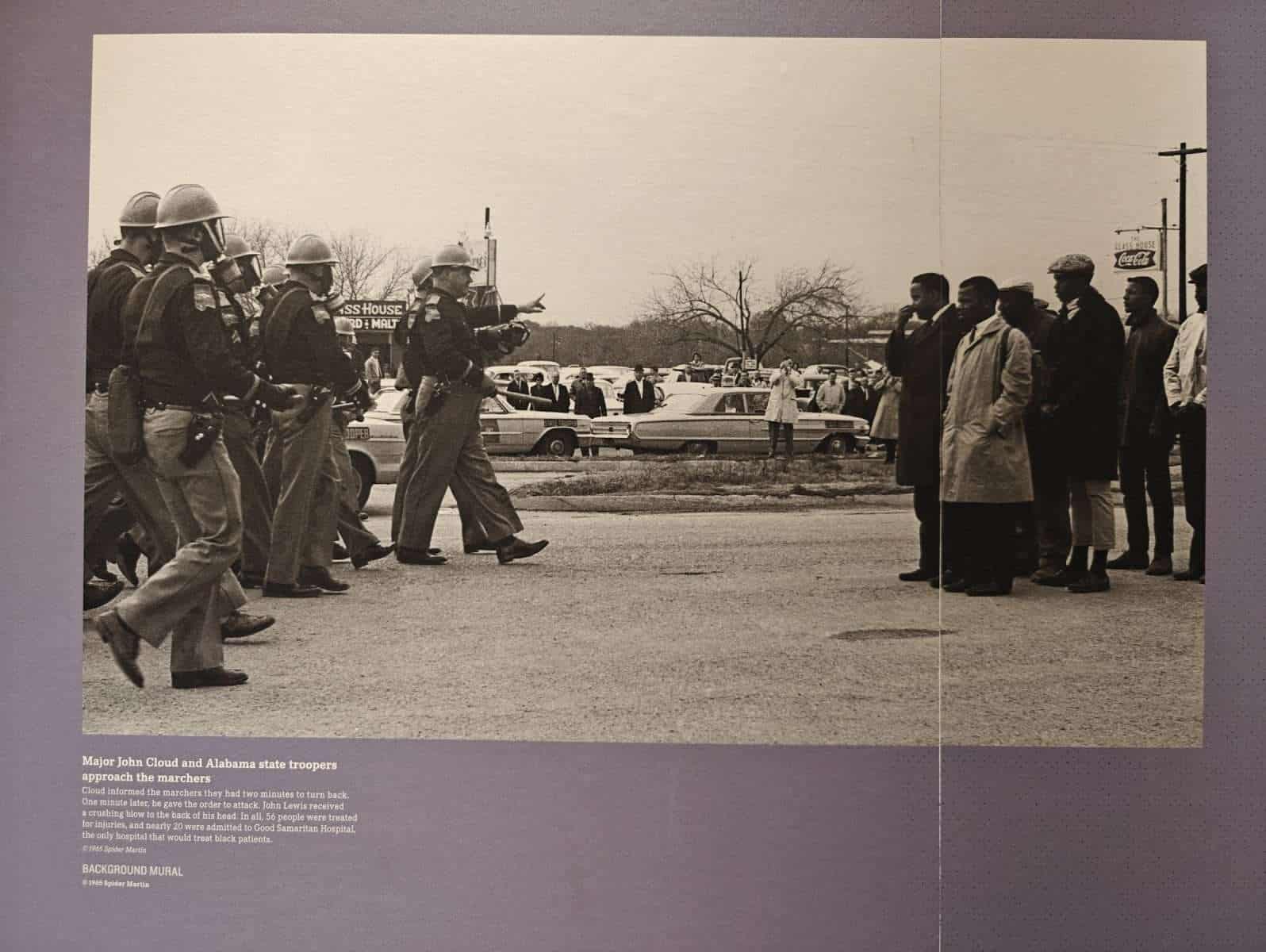 A historical photograph of a civil rights protest in a display at the National Civil Rights Museum in Memphis.